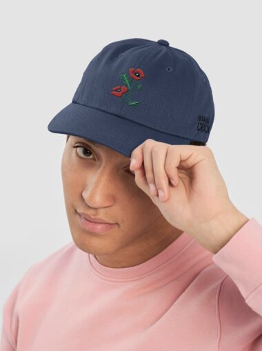 Model wearing a navy BDC cap